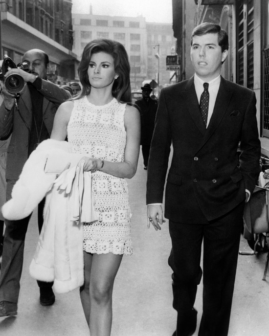 PARIS, FRANCE: US actress Raquel Welch and her new-wed husband US producer Patrick Curtis take a walk in Paris' streets 14 February 1967. They have married the same day at the City Hall of Paris 8th district. (Photo credit should read AFP/AFP/Getty Images)